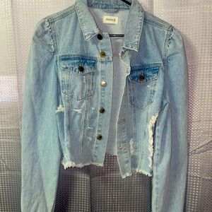 Jean jacket with hamsa patch